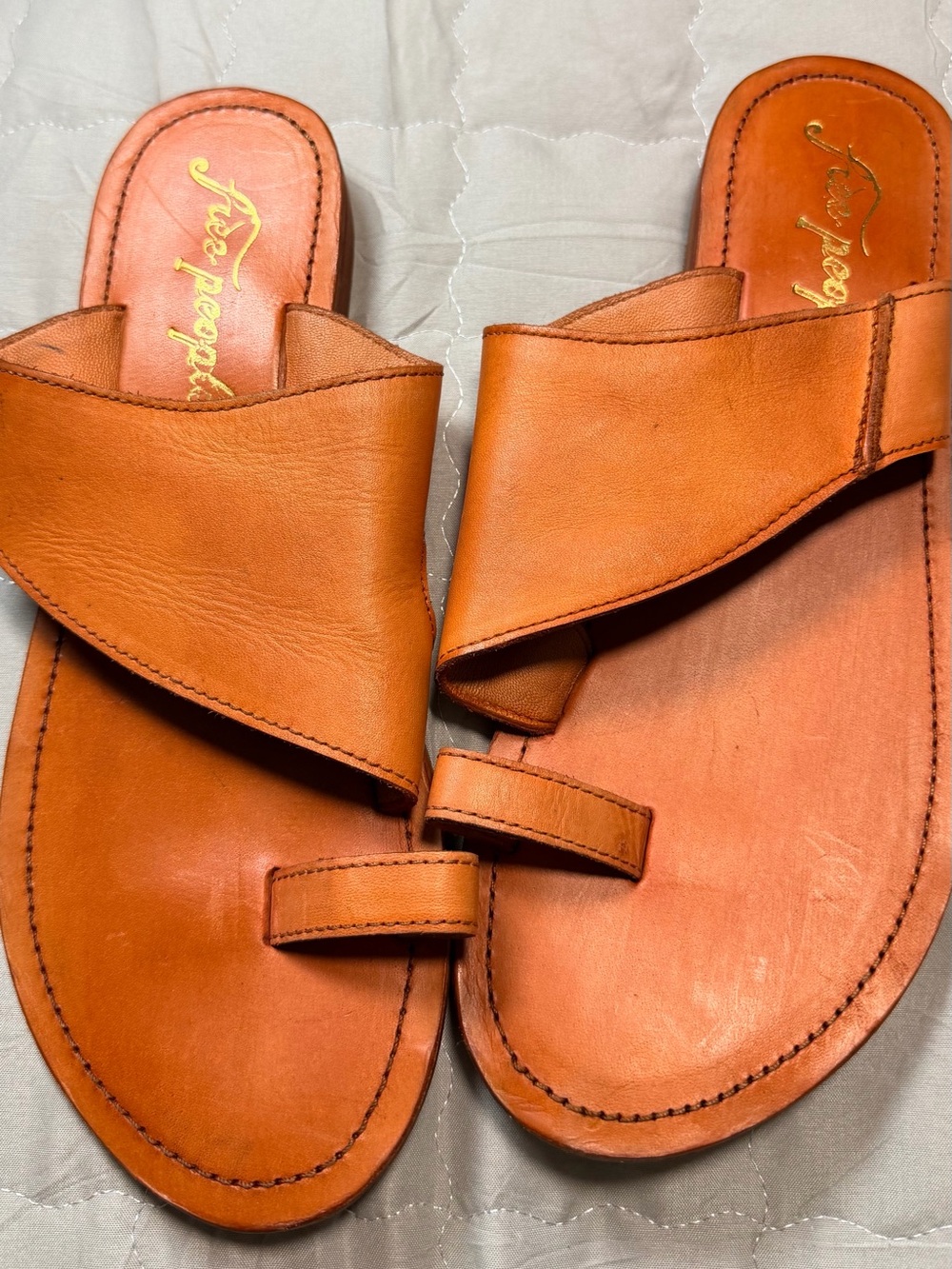 Free People Sant Antoni Slides with an asymmetric leather strap and a toe loop